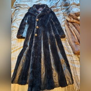 Hello this is a vintage fur coat.